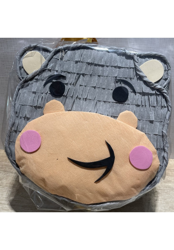 Piñata redonda echa en papel y a mano forma de animales 