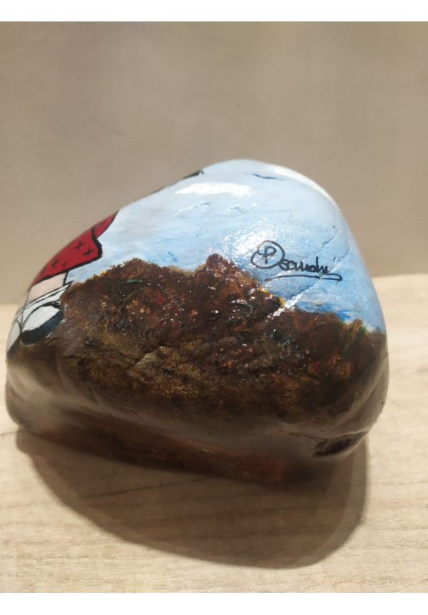 Piedra Natural Mafalda Pintada a mano. Pintura acrílica en piedra, pela artista Pilar Sánchez. 17x14x11 cm.